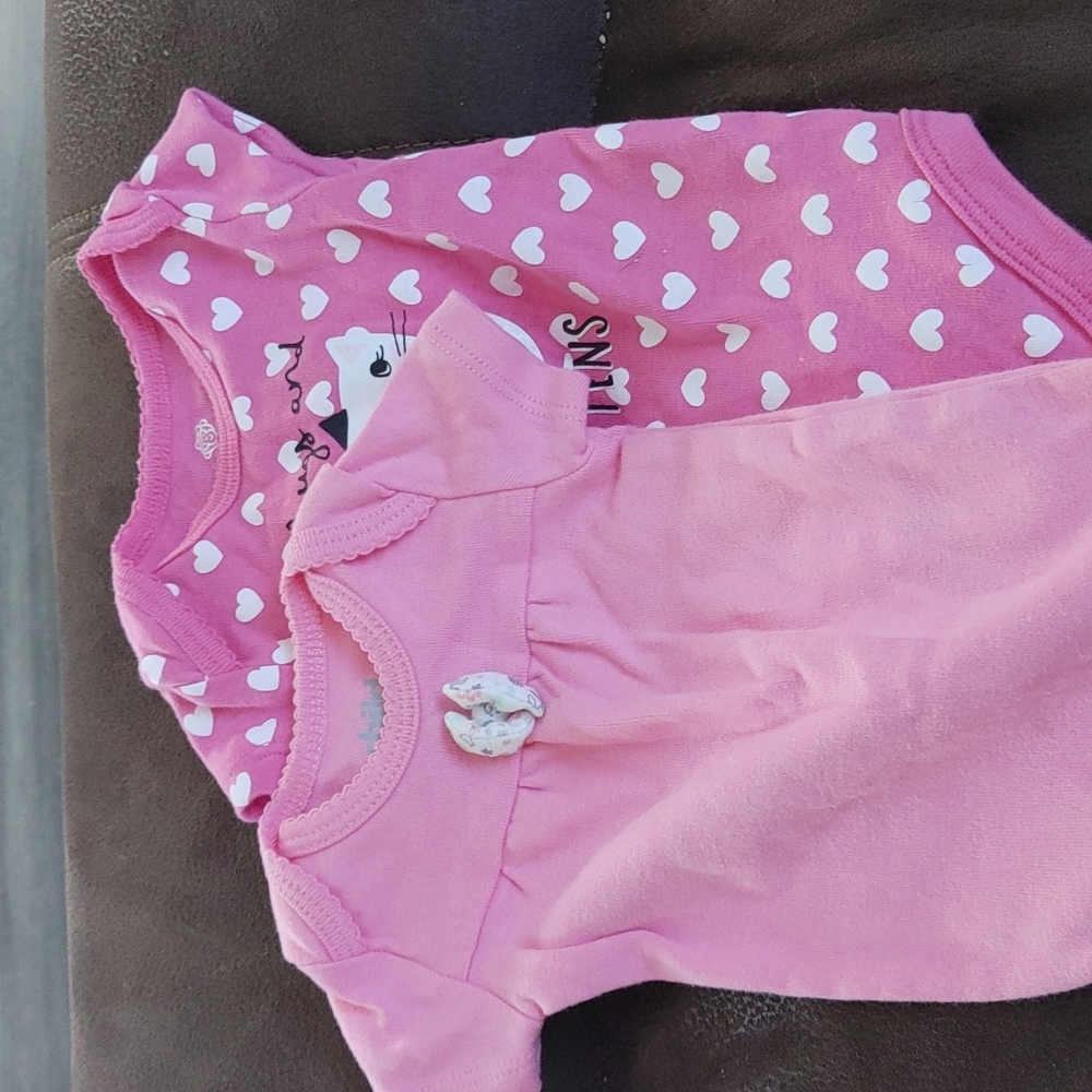 2 newborn baby girl onesies